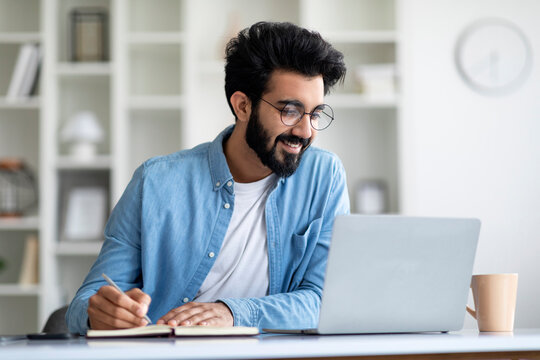 Smiling Man with laptop